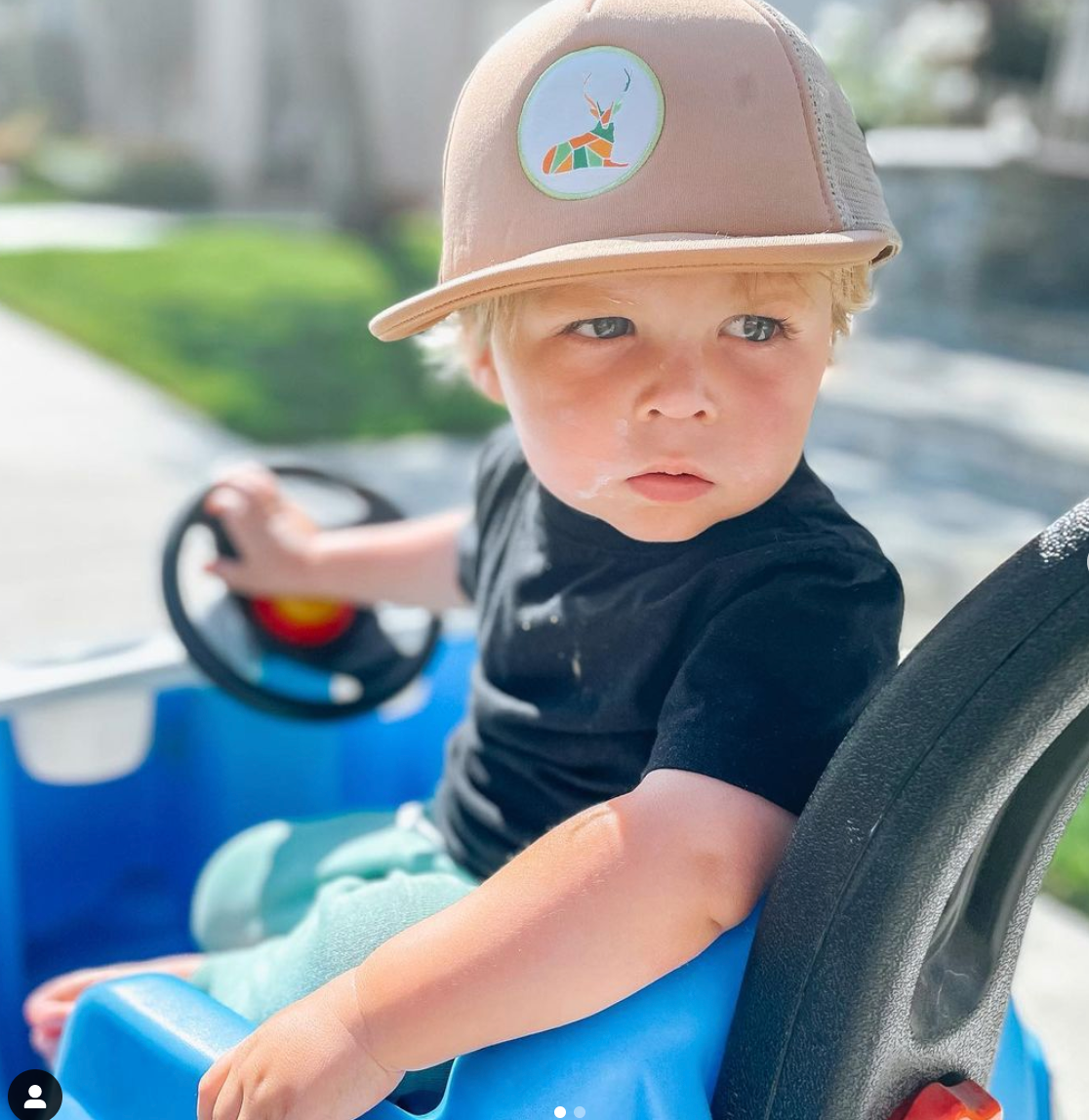 Cute kid in trucker hat